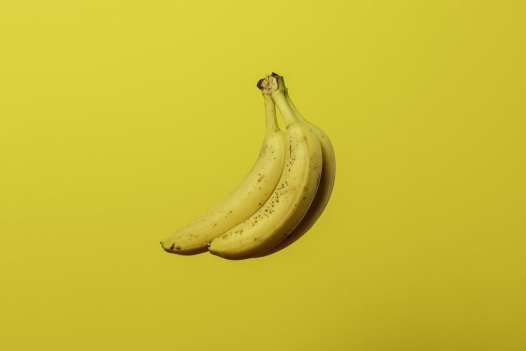 Copy space Photo of Yellow Bananas - banana tea